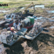 Airboats, Marsh Masters, and excavators in remote marshlands